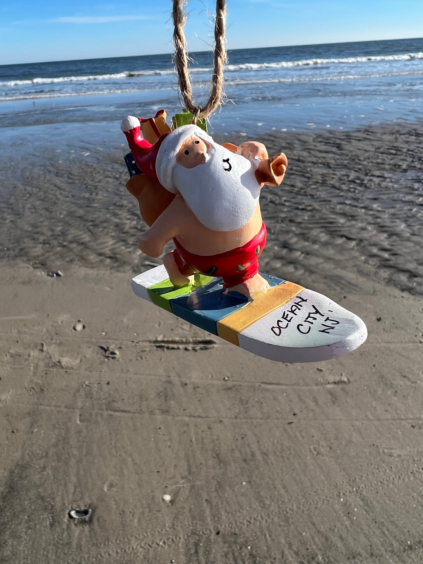 Santa on Surfboard Ornament