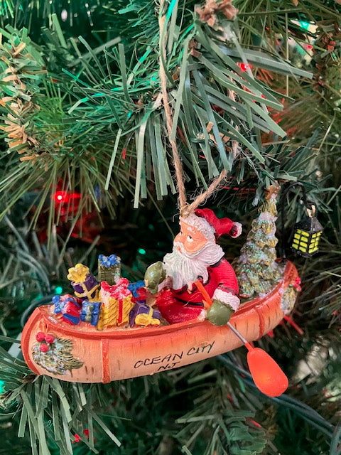 Santa In Birch Canoe Ornament