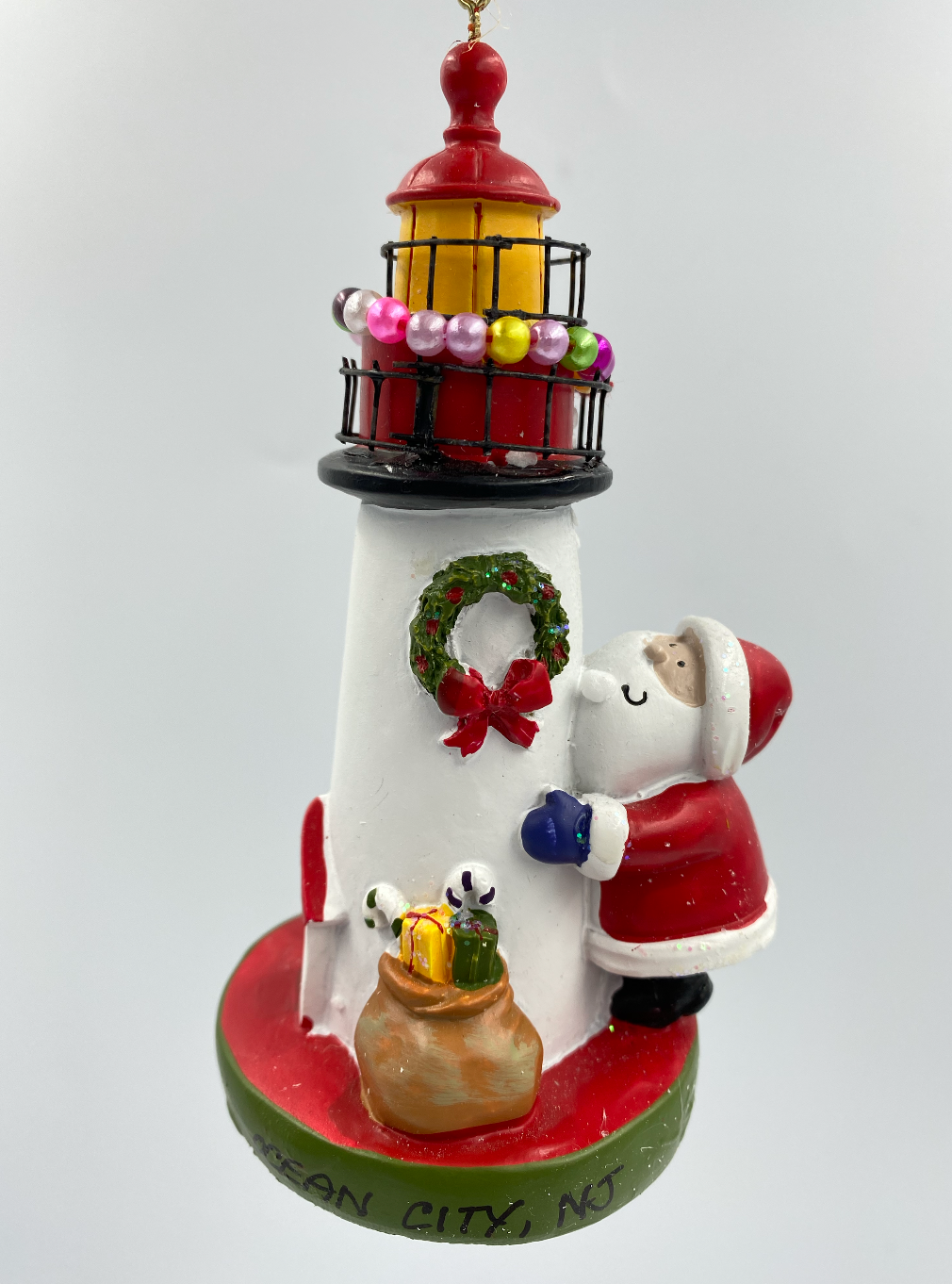 Santa W/ Lighthouse ornament
