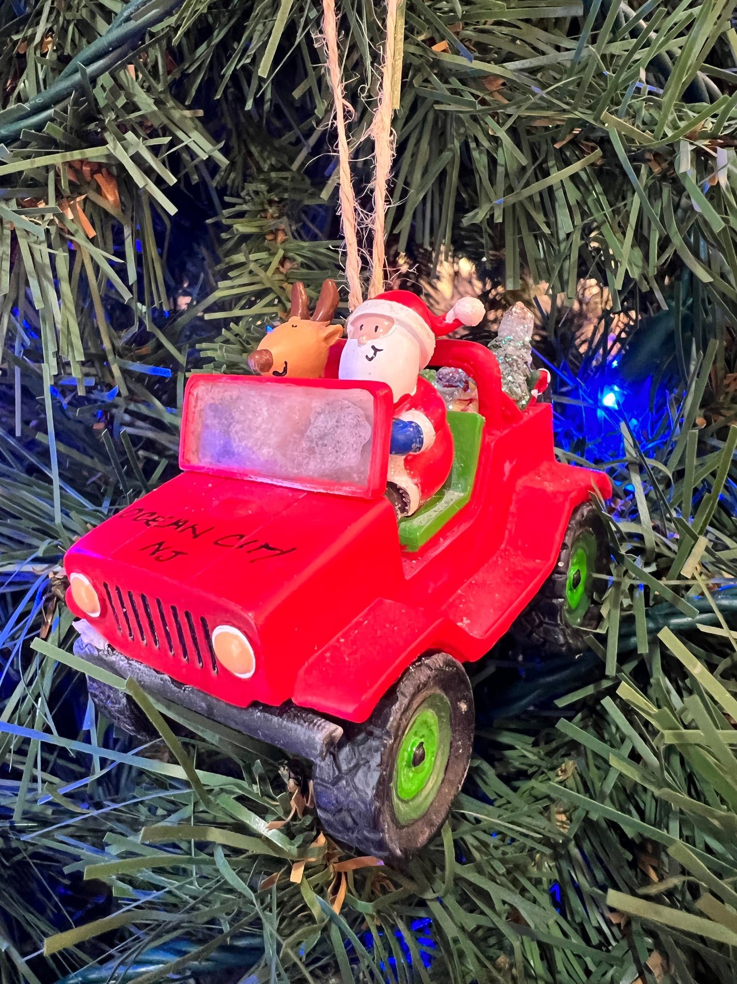 Santa in Red Jeep ornament