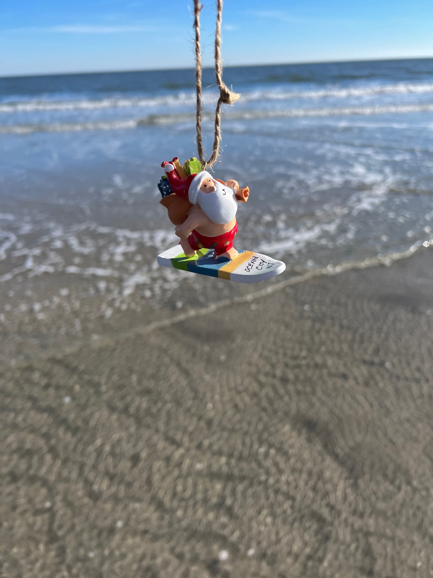 Santa on Surfboard Ornament