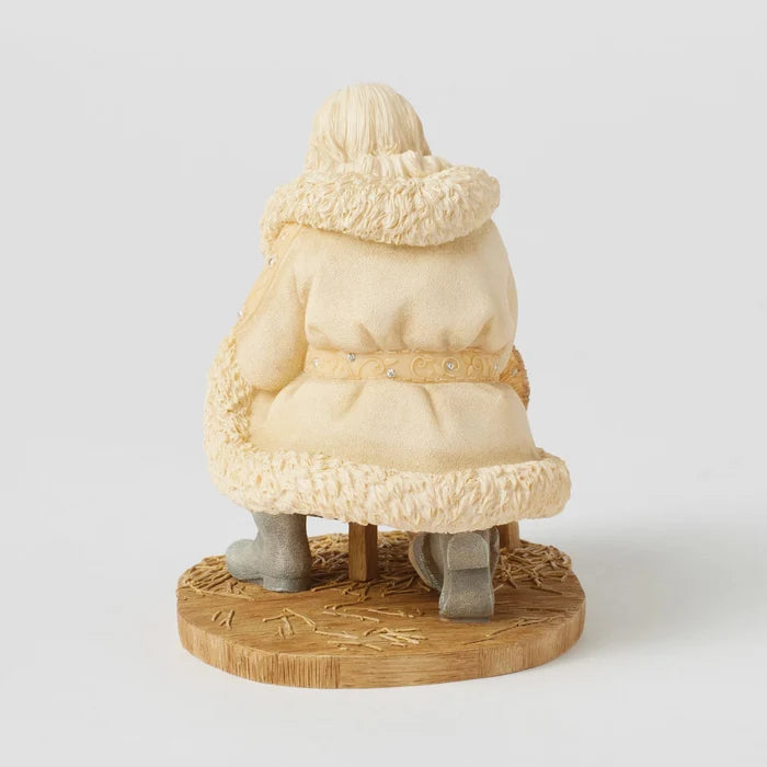 Santa With Baby Jesus Figurine