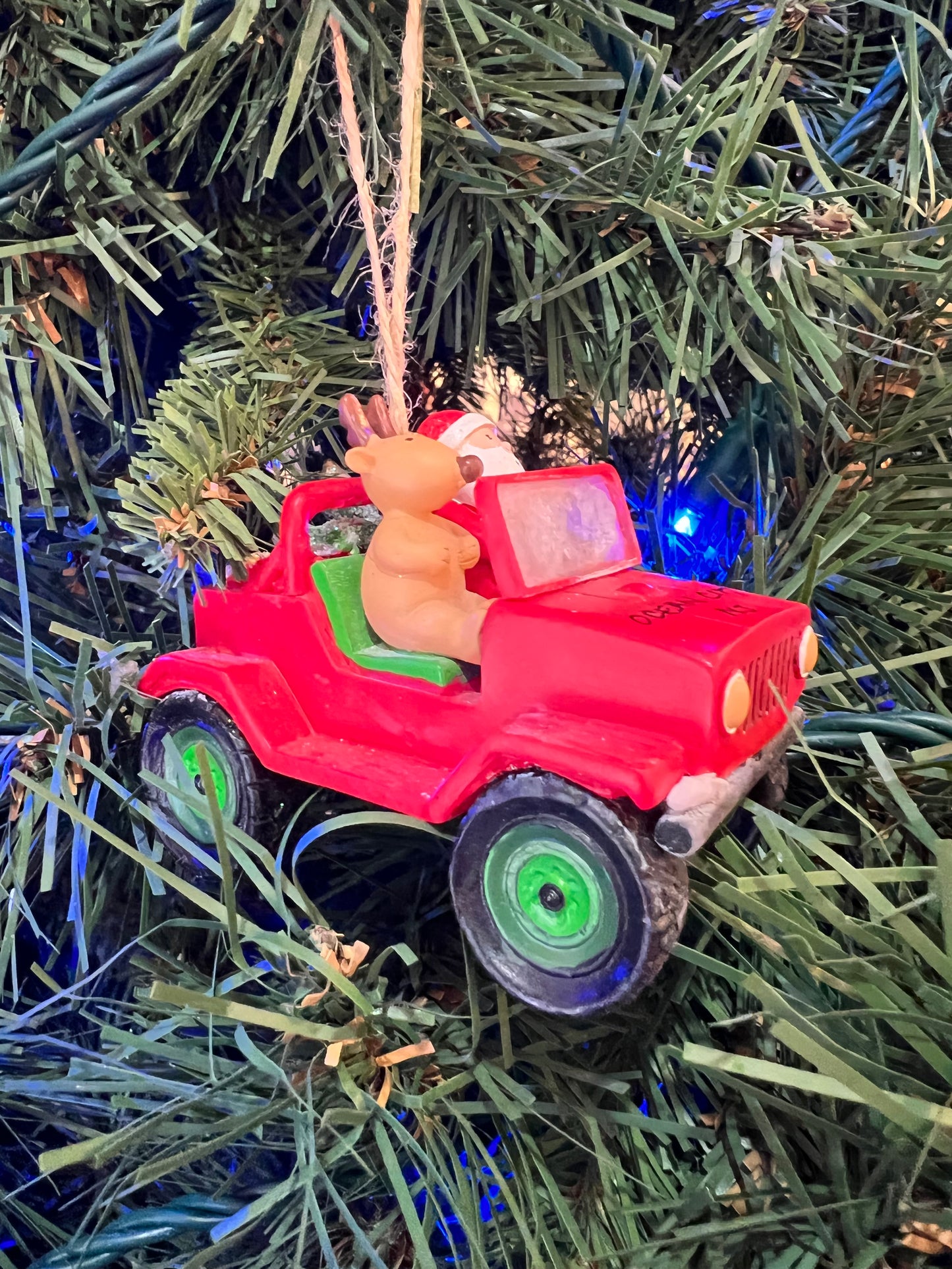 Santa in Red Jeep ornament