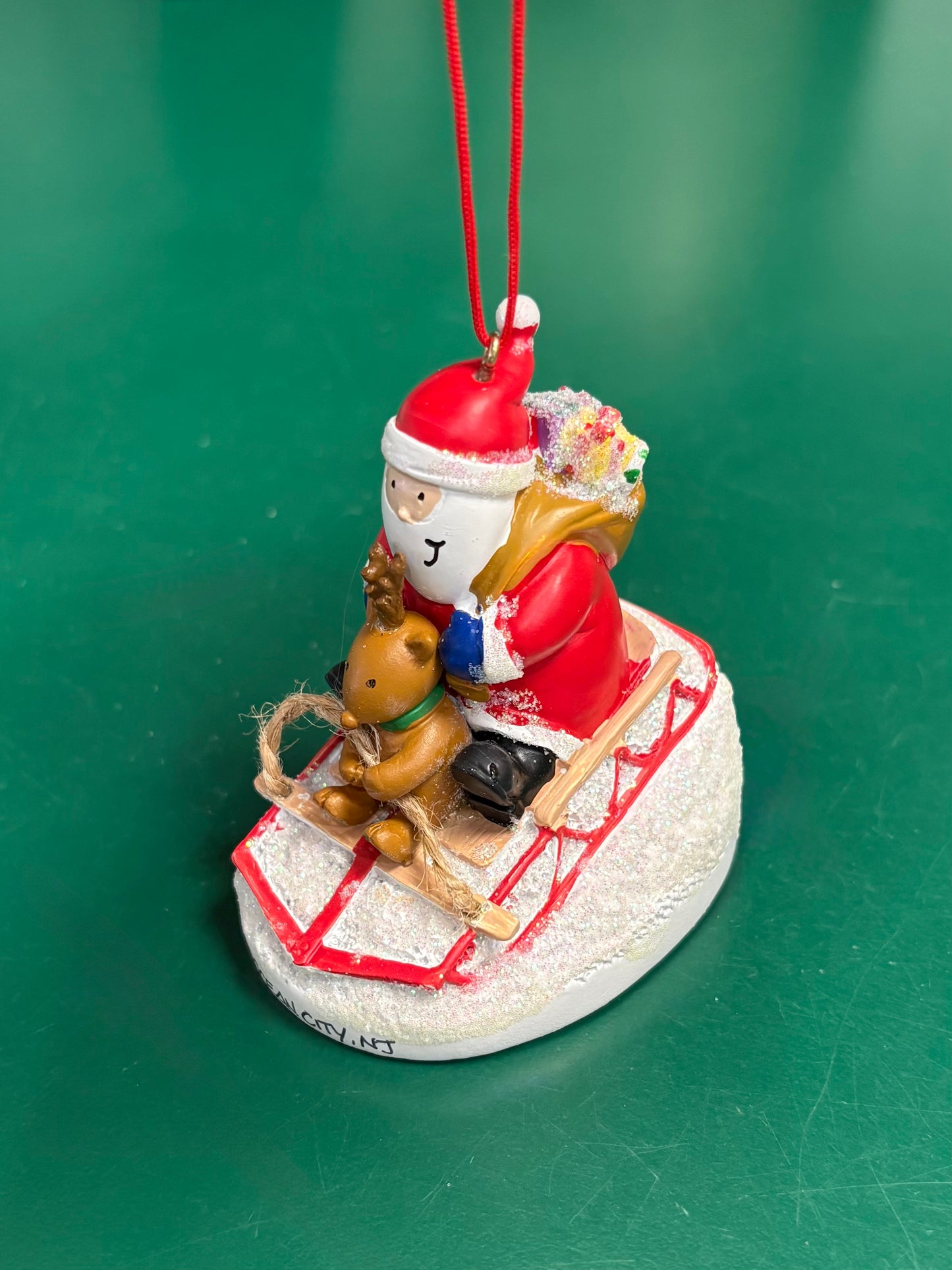 Santa Sledding with Friend Ornament