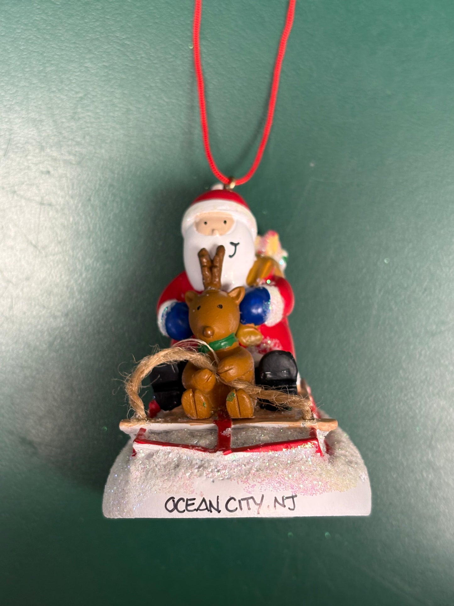 Santa Sledding with Friend Ornament