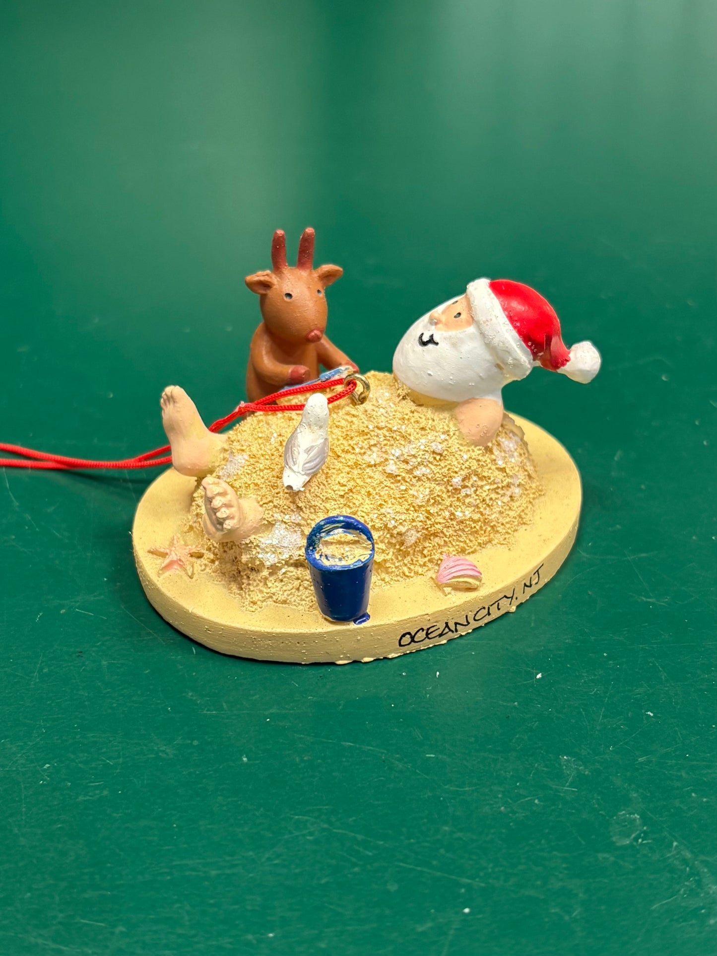 Santa in Sand w/ Reindeer Ornament