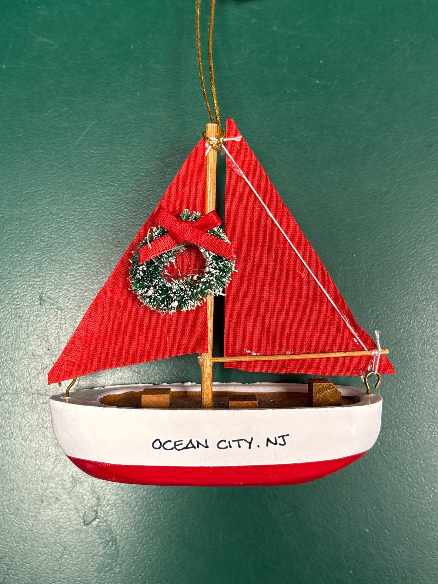 Red Bottom Wood Sail Boat