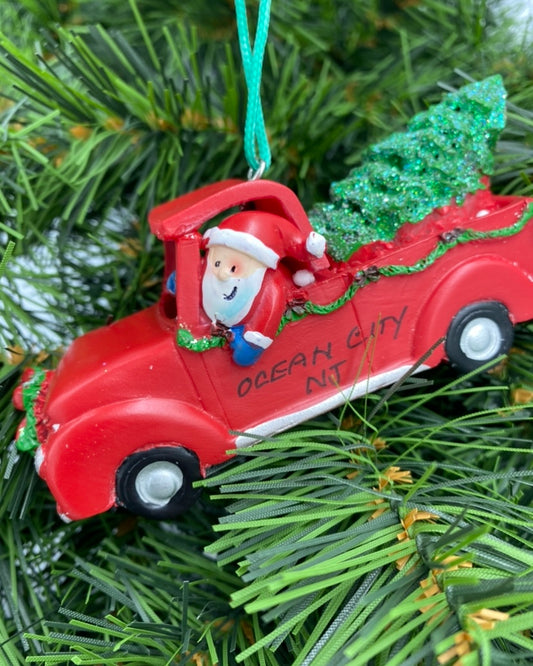 Santa in Red Pickup Truck